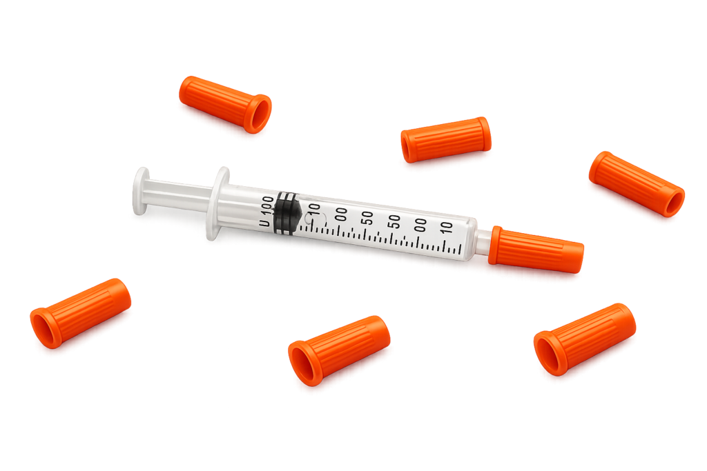 Single-use medical syringe and precision-molded needle caps