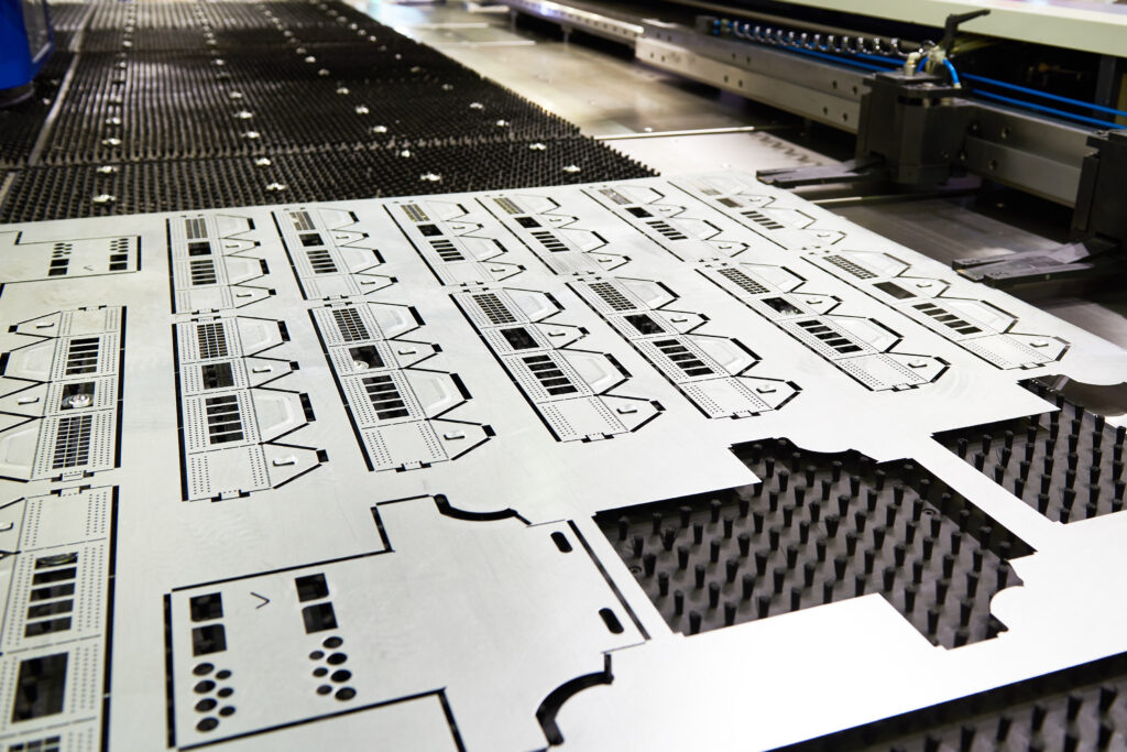 The metal parts mass production by progressive die in the light blue scene. The sheet metal working process by transfer die.